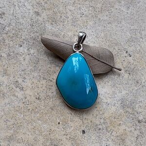 Elegant Silver and Turquoise Pendant
